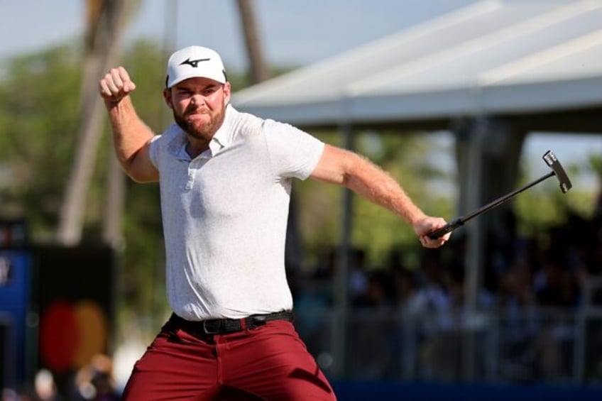 American Grayson Murray celebrates after making a 38-foot birdie putt on the first playoff hole that made him a winner at the PGA Sony Open in Hawaii