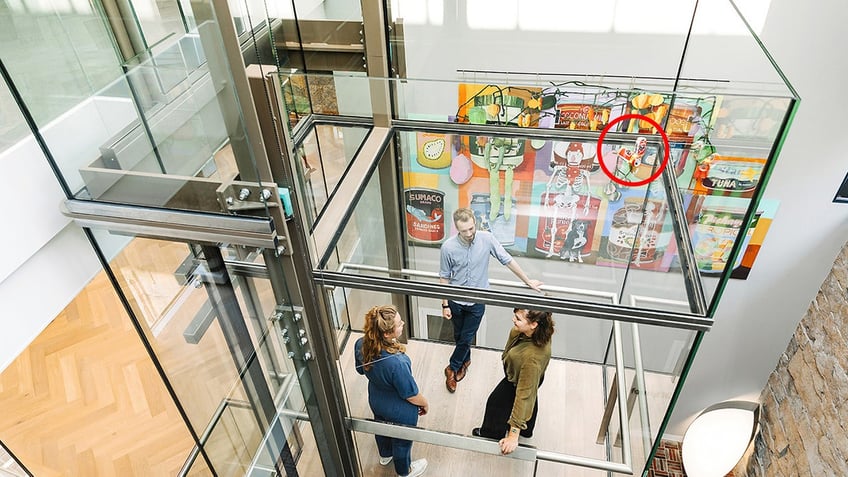 Elevator beer cans