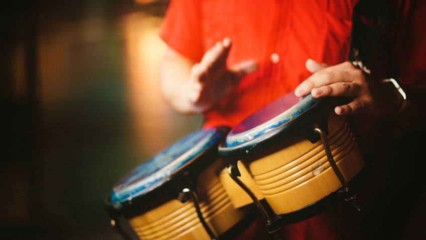 Man playing bongos