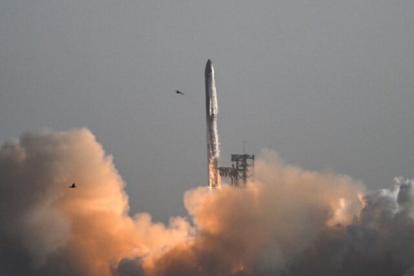 CAPTION: SpaceX's Starship spacecraft lifts off from Starbase near Boca Chica, Texas, on M