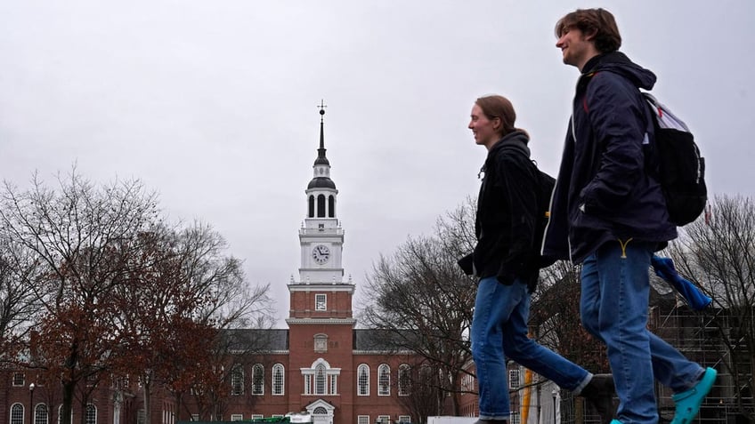 Students cross the campus of Dartmouth College