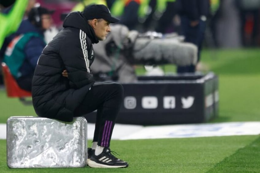 Bayern Munich coach Thomas Tuchel sat on a silver suitcase to watch Saturday's 2-1 win ove