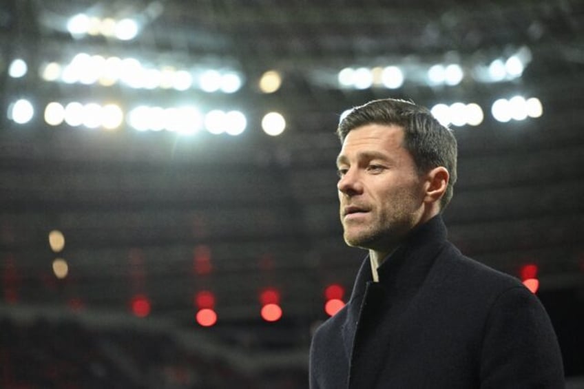 Bayer Leverkusen coach Xabi Alonso said links to Bayern Munich and Liverpool were "just sp