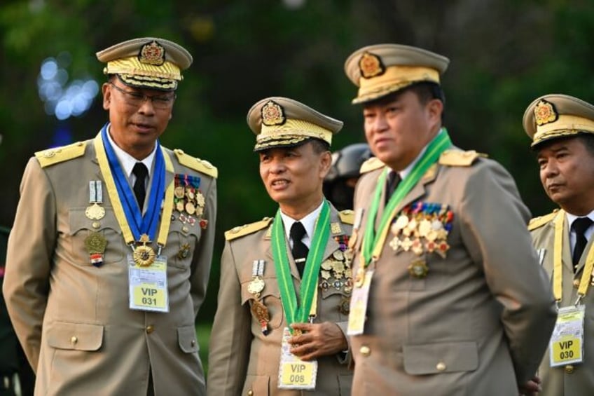 High-ranking Myanmar military officials attend a ceremony marking the country's Armed Forc