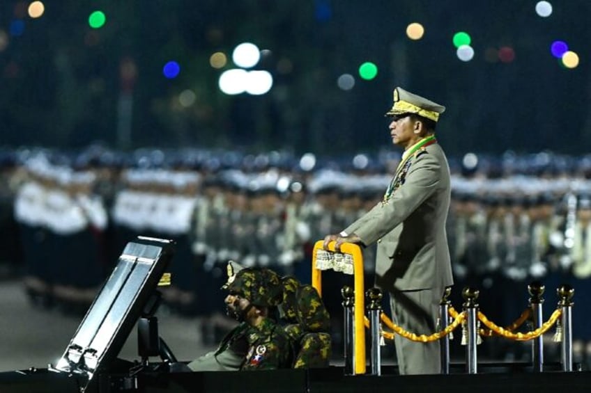 Myanmar's junta chief military Min Aung Hlaing arrives to deliver a speech during a ceremo