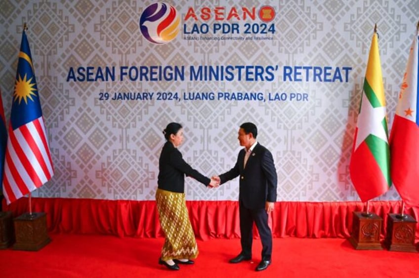 Marlar Than Htike (L) was the first senior Myanmar official to attend a high-level ASEAN gathering in more than two years