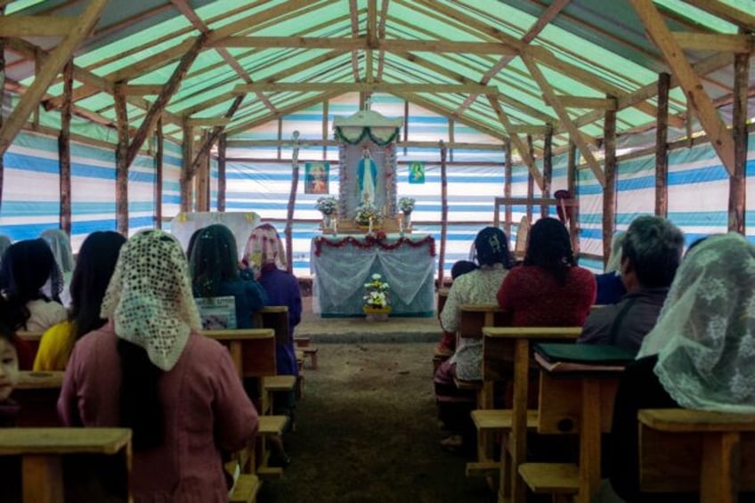 myanmars displaced pray and teach under deadly skies