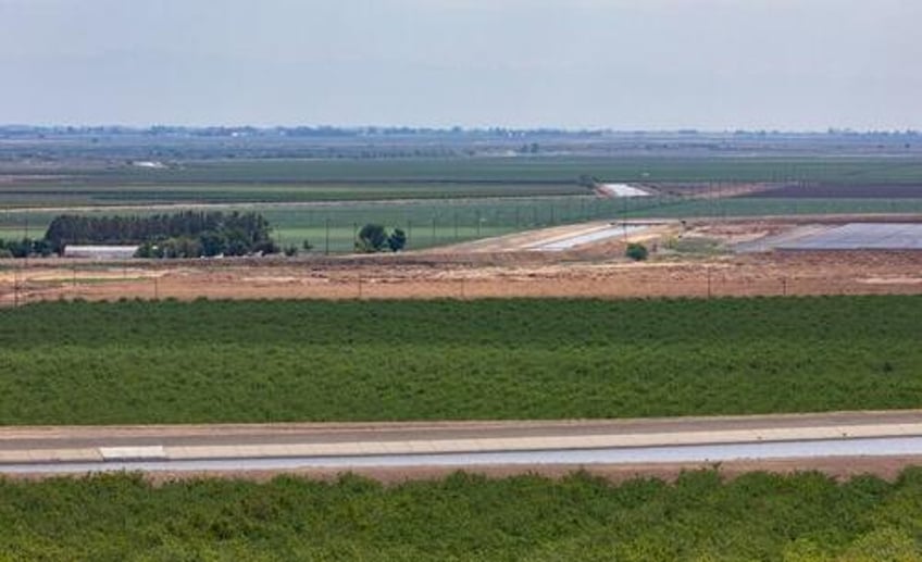 mysterious land acquisition group sues farmers after buying land surrounding air force base