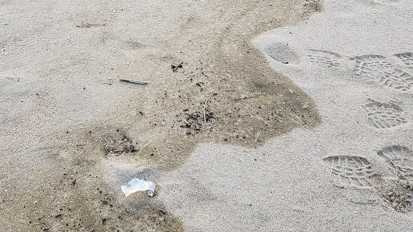 mysterious tar balls wash up on new jersey beaches