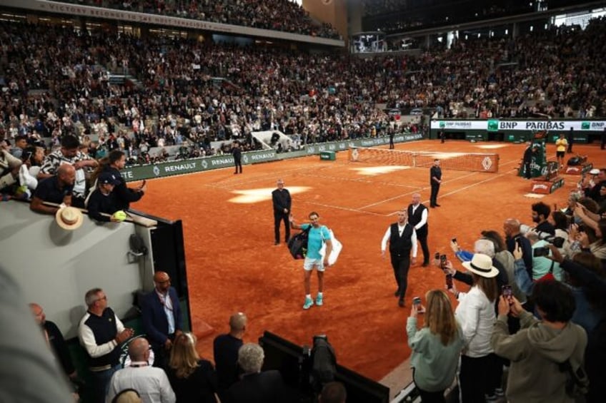 'Last time': Rafael Nadal gestures as he leaves the court