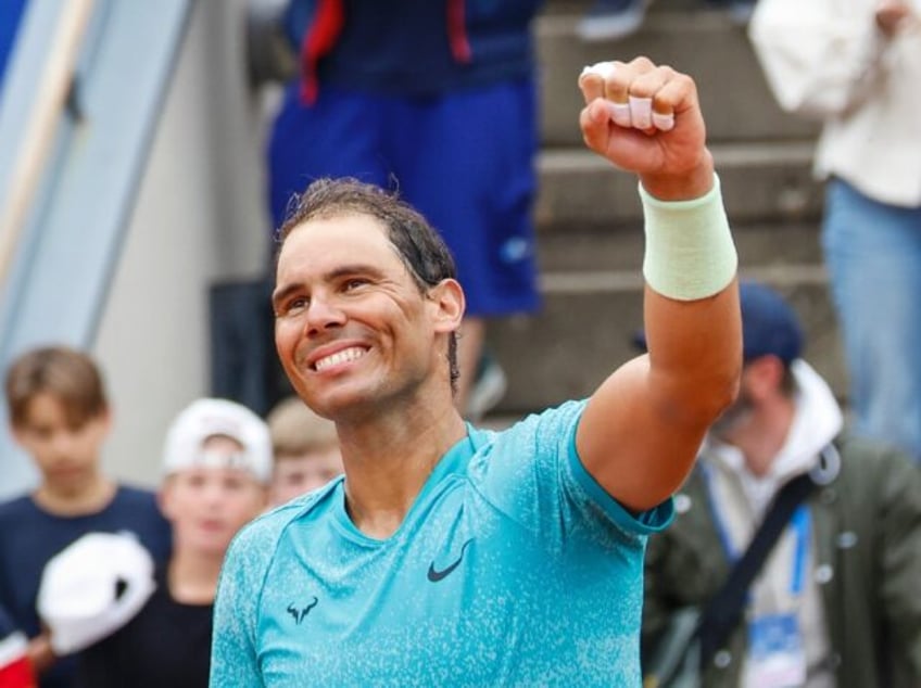 Spain's Rafael Nadal, celebrating a victory in his first match since May 27, was among tho