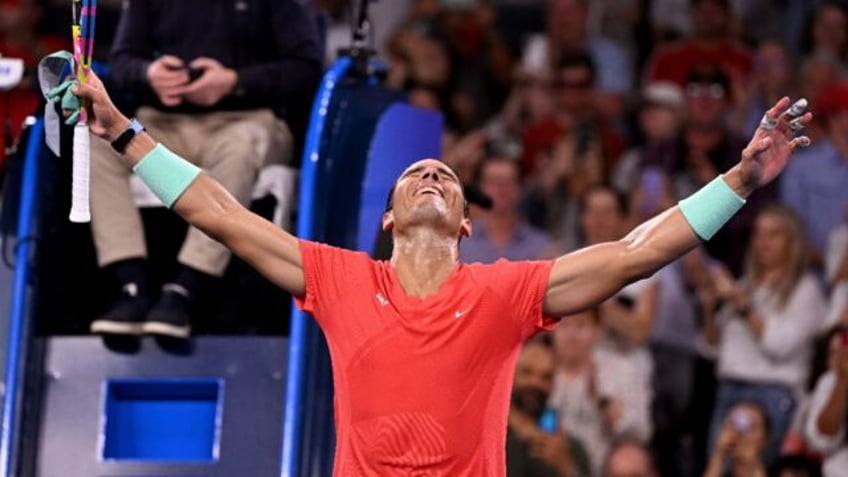 Spain's Rafael Nadal celebrates winning his men's singles match against Austria's Dominic Thiem