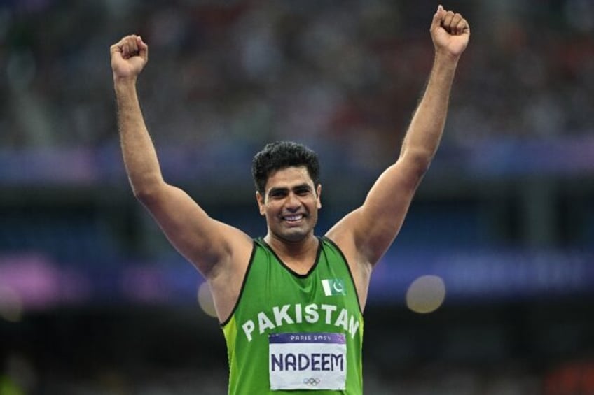 Pakistan's Arshad Nadeem reacts as he competes in the men's javelin throw final