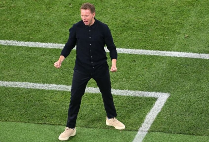 Julian Nagelsmann celebrates Germany's fifth goal in their 5-1 win against Scotland