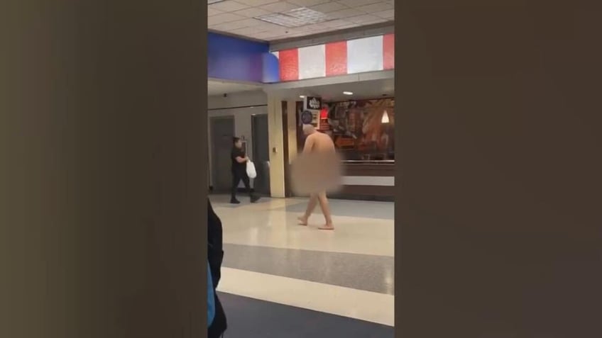 naked man strolling through dfw airport taken into custody for mental health evaluation