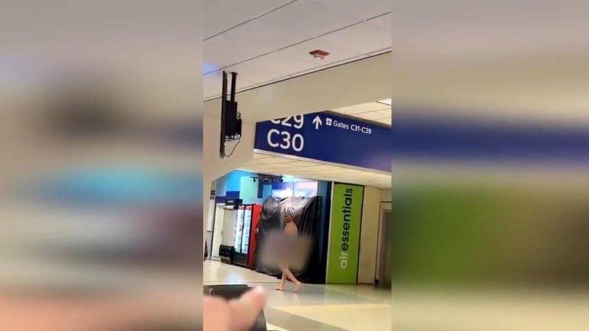 naked man strolling through dfw airport taken into custody for mental health evaluation