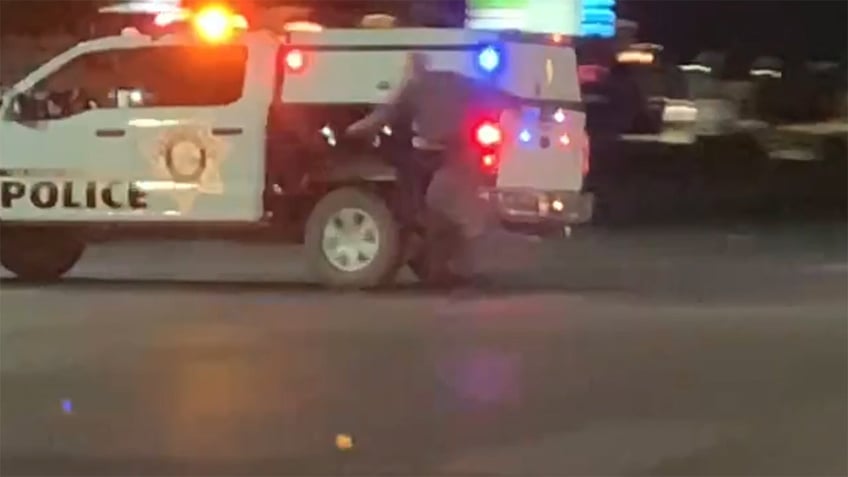 naked man tussles with las vegas cop before stealing crashing patrol car video