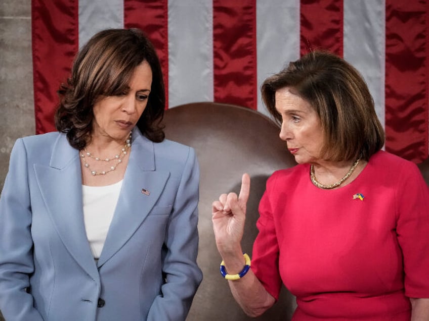 U.S. Vice President Kamala Harris (L) and Speaker of the House Nancy Pelosi (D-CA) await t