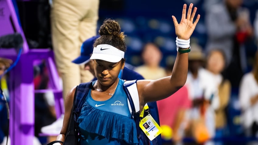 Naomi Osaka of Japan walks off the court. 