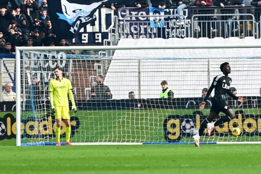 Assane Diao (R) netted Como's winner against Napoli