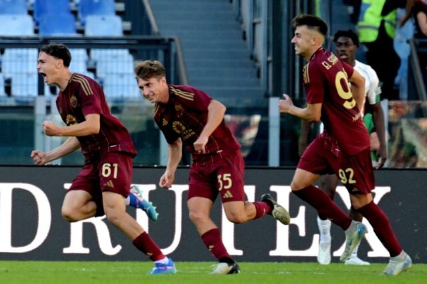 Roma's Niccolo Pisilli (L) scored late to secure a 2-1 win over Venezia