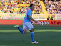 Napoli move step closer to Serie A crown after win at fiery Lecce
