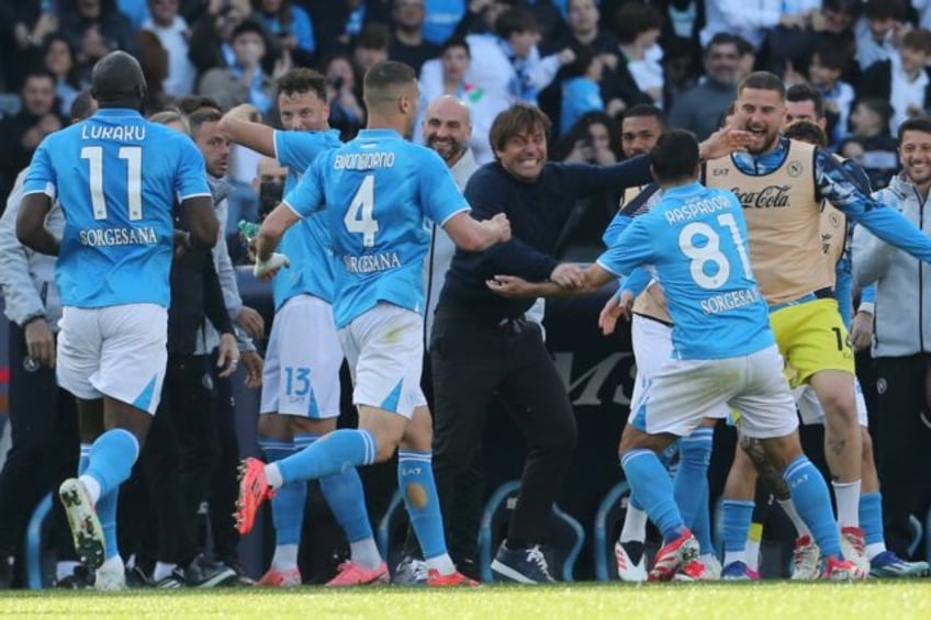 Giacomo Raspadori celebrates his goal with Napoli coach Antonio Conte