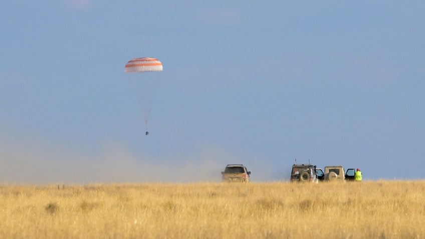 nasa astronaut returns to earth after 371 days in space a us record for longest continuous spaceflight