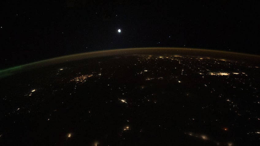 nasa captures stunning photos of suns rays over earth see the jaw dropping images