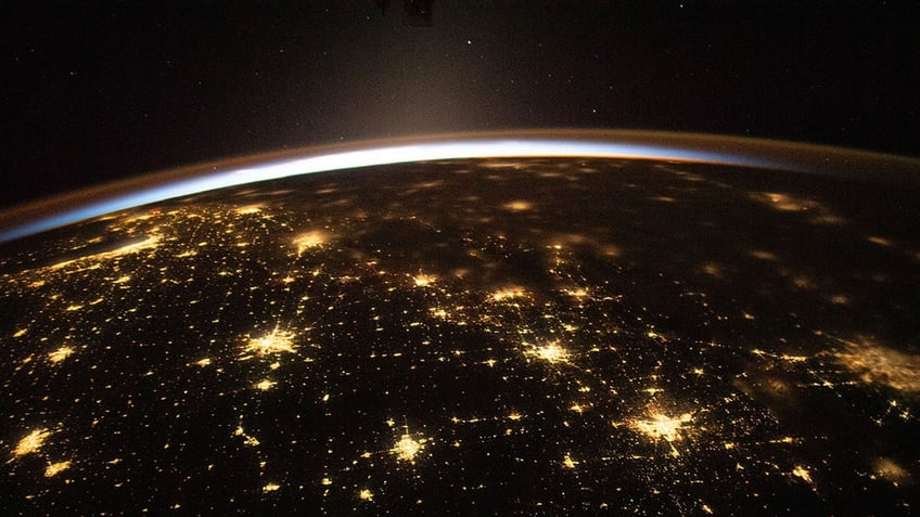 nasa captures stunning photos of suns rays over earth see the jaw dropping images