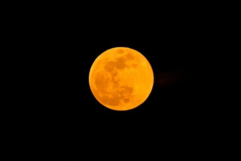 A supermoon rises over Singapore on October 17, 2024