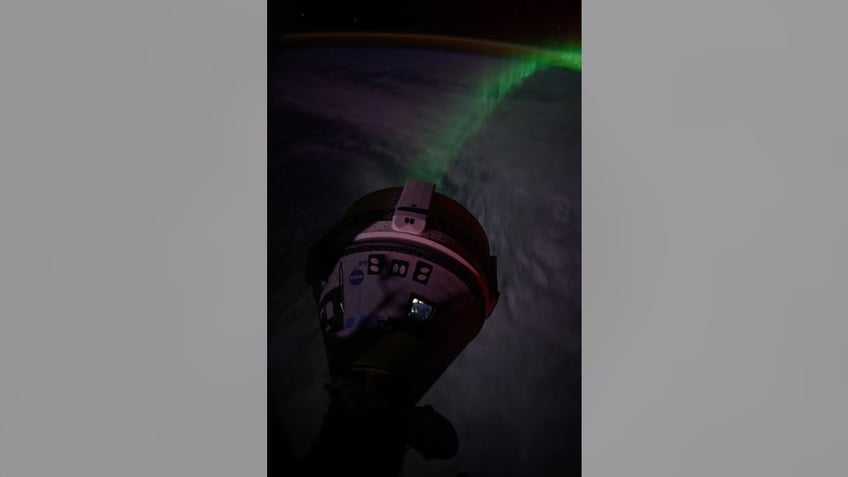 "An aurora streams below Boeing’s Starliner spacecraft docked to the forward port on the Harmony module as the International Space Station soared 266 miles above the Indian Ocean southwest of Australia," according to NASA.