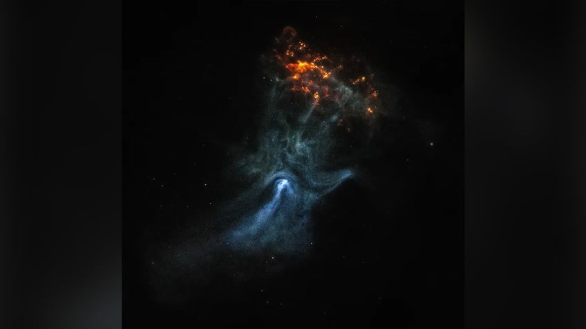 nasa reveals ghostly cosmic hand 16000 light years from earth