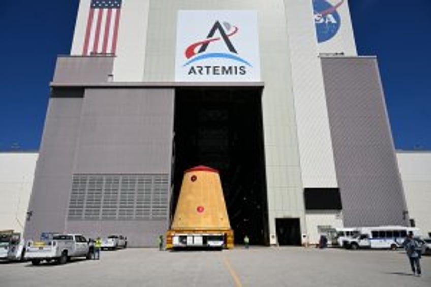 NASA rolls out Artemis II Orion spacecraft, twin rocket boosters for moon mission