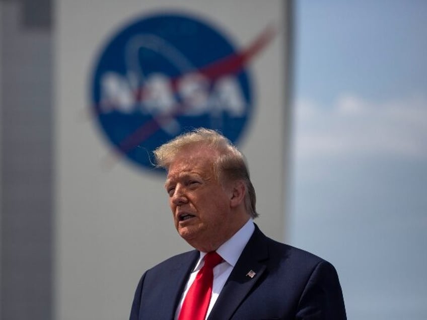 Donald Trump in front of NASA building