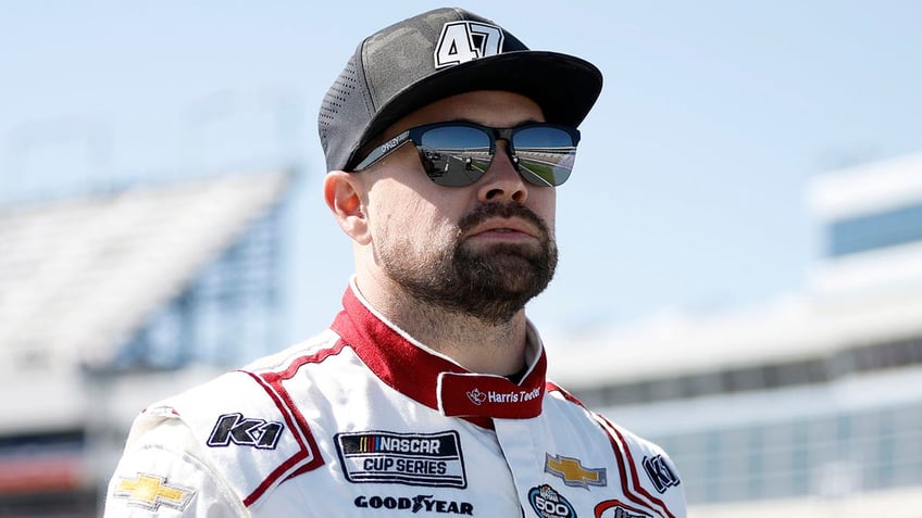 nascar driver ricky stenhouse jr flees as car fills with smoke