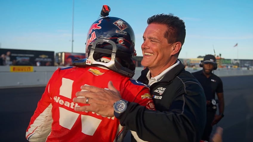 Matt Kaulig hugs Shane van Gisbergen