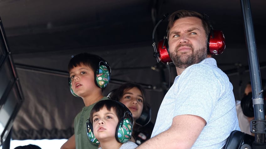 Vance and family at NASCAR race