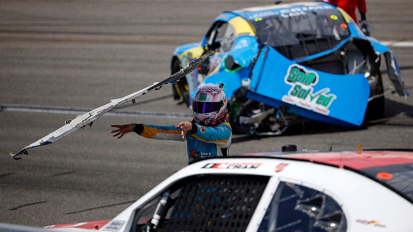 Joey Gase throws piece of his bumper