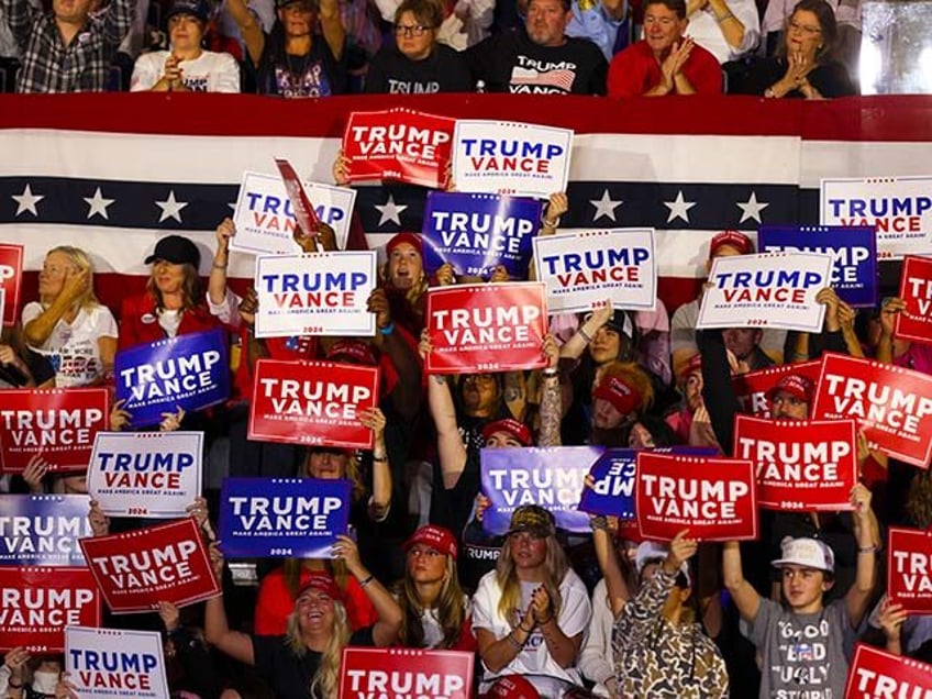 Supporters of former US President and Republican presidential candidate Donald Trump cheer