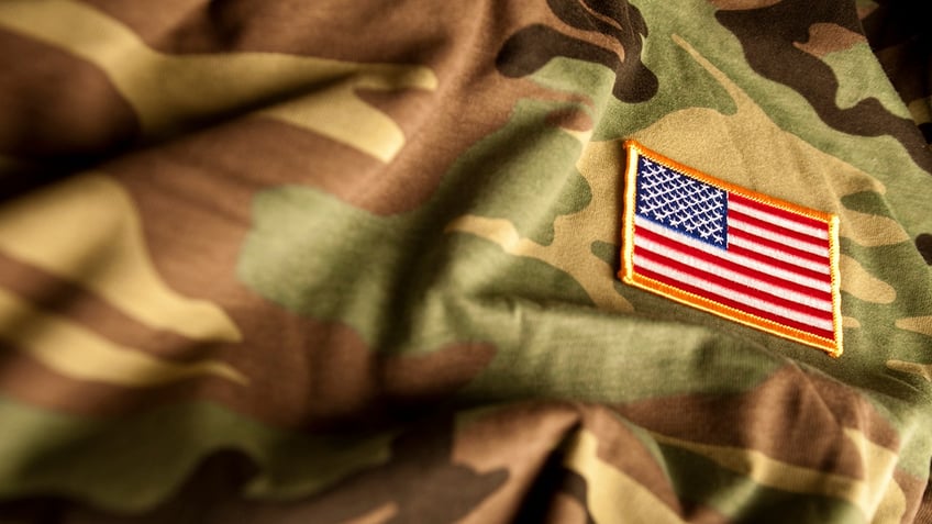 File of camouflage with an American flag patch