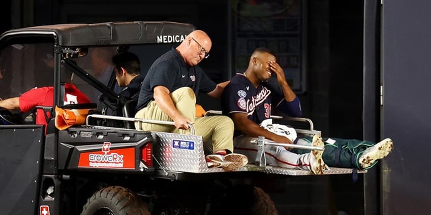 nationals reveal stone garretts gruesome injury suffered at yankee stadium while trying to rob home run