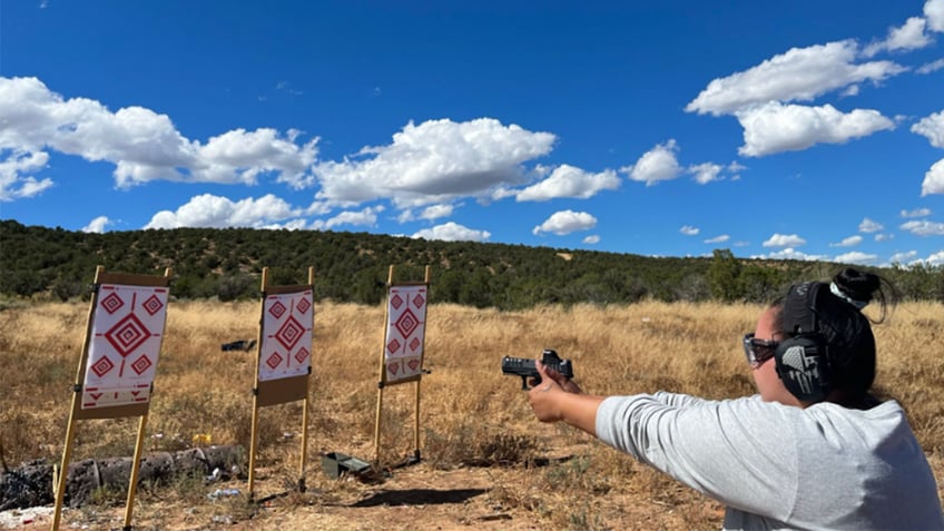 native american women taking up firearms classes for self defense refusing to be victims