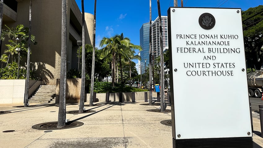 A sign for the Prince Jonah Kuhio Kalanianaole Federal Building and Courthouse