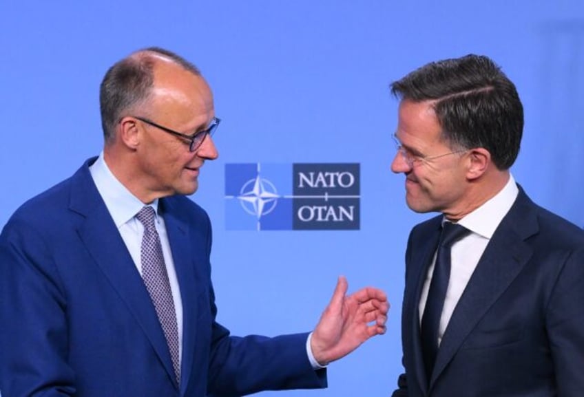 German Chancellor Friedrich Merz, left, with NATO chief Mark Rutte at the alliance headqua