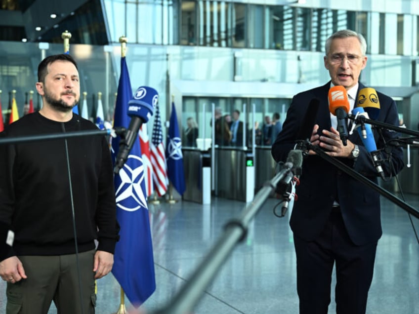 BRUSSELS, BELGIUM - OCTOBER 11: NATO Secretary General Jens Stoltenberg (R) makes a speech