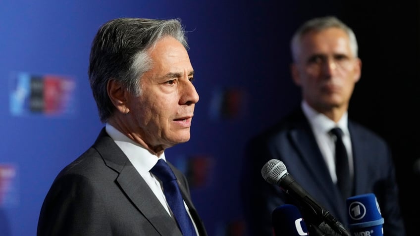 United States Secretary of State Antony Blinken, left, and NATO Secretary General Jens Stoltenberg, right, speak with the media prior to a meeting of NATO foreign ministers at the Czernin Palace in Prague