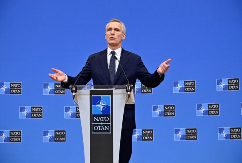 NATO chief Jens Stoltenberg said 18 of the alliance's 31 countries will hit its defence sp