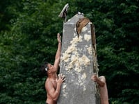 Naval Academy plebes scale greased 21-foot Herndon Monument in annual freshman year tradition