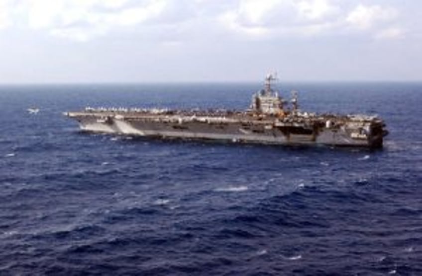 Navy aircraft carrier collides with merchant vessel in Red Sea